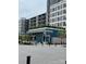 The Batch Yard exterior with an appealing design and outdoor seating, complemented by nearby residences at 13024 Moon Rd # 44, Charlotte, NC 28277