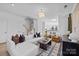 Spacious living area with comfortable seating, natural light, and stylish accents at 13024 Moon Rd # 44, Charlotte, NC 28277