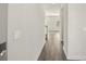 Inviting hallway with hardwood floors that leads to an open living space with lots of natural light at 1333 Morehead Dr, Salisbury, NC 28144
