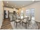 Eat-in kitchen with stainless steel appliances and white cabinets at 1333 Morehead Dr, Salisbury, NC 28144