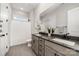 Bathroom showcasing dual sinks, gray tile flooring, and a large vanity at 267 Triple Ponds Ct # 11, Clover, SC 29710