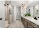 Modern bathroom featuring double vanity, a tiled walk-in shower with bench, and a neutral color palette at 267 Triple Ponds Ct # 11, Clover, SC 29710