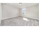 Bright bedroom featuring neutral carpets and natural light at 267 Triple Ponds Ct # 11, Clover, SC 29710