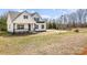 Exterior of home with a black trim and neutral siding sitting on an expansive lot at 267 Triple Ponds Ct # 11, Clover, SC 29710