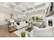Spacious living room with coffered ceilings, fireplace, and sliding glass doors leading to the outdoors at 267 Triple Ponds Ct # 11, Clover, SC 29710