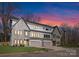 Three-unit modern townhome building with gray and white exterior at 2911 Hilliard Dr, Charlotte, NC 28205