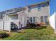 A fenced backyard with a patio and shed provides a private outdoor living space at 3000 Misty Harbor Cir # F, Cramerton, NC 28032