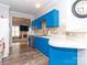 Stylish kitchen with blue cabinets and stainless steel dishwasher at 3000 Misty Harbor Cir # F, Cramerton, NC 28032