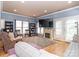 Spacious living room with a fireplace, tv, and ample seating at 3000 Misty Harbor Cir # F, Cramerton, NC 28032