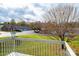 Back porch view showing landscaping and surrounding neighborhood at 123 23Rd Nw St # E, Hickory, NC 28601