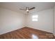 A well-lit bedroom featuring wood floors and a modern ceiling fan at 123 23Rd Nw St # E, Hickory, NC 28601