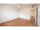 A light-filled bedroom is equipped with a ceiling fan, hardwood floors and closet at 123 23Rd Nw St # E, Hickory, NC 28601