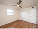 A cozy bedroom with wood floors, large closet, and natural light at 123 23Rd Nw St # E, Hickory, NC 28601