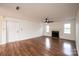 Bright living room featuring a fireplace, wood floors, and neutral paint at 123 23Rd Nw St # E, Hickory, NC 28601