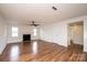 Inviting living room with fireplace, wood-look flooring, and natural light at 123 23Rd Nw St # E, Hickory, NC 28601