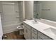 Clean, well-lit bathroom with a double vanity, a bathtub and shower combination, and neutral finishes at 2615 Tillman St, Monroe, NC 28112