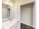 Charming bathroom features a bright vanity with a mirror and a glimpse into another room at 127 Jentri Way, Mooresville, NC 28115