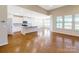 An expansive living area featuring hardwood floors and plenty of natural light from large windows at 127 Jentri Way, Mooresville, NC 28115