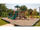 Community playground with playset and safe surface at 3861 Cullen Meadows Dr, Davidson, NC 28036