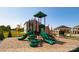 Modern playground with slides, climbing structures, and tire steps at 3861 Cullen Meadows Dr, Davidson, NC 28036