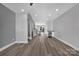Spacious living room with hardwood floors and recessed lighting at 582 West End Dr, Charlotte, NC 28208