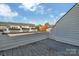 Patio area showcasing outdoor living space, with views of the neighborhood's townhome architecture at 582 West End Dr, Charlotte, NC 28208