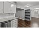 Updated kitchen featuring granite countertops and ample cabinetry at 6641 Melody Ln, Charlotte, NC 28215