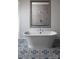 Stylish bathroom featuring a freestanding tub and patterned tile at Lot 51 Watercourse Way # Nottingham, Belmont, NC 28012