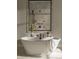Elegant bathroom with freestanding tub and walk-in shower at Lot 51 Watercourse Way # Nottingham, Belmont, NC 28012