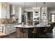 Spacious kitchen with white cabinets, large island, and modern appliances at Lot 51 Watercourse Way # Nottingham, Belmont, NC 28012