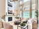 Spacious living room with fireplace, large windows, and comfortable seating at Lot 51 Watercourse Way # Nottingham, Belmont, NC 28012