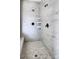 Large walk-in shower with pebble floor and tile surround at Lot 51 Watercourse Way # Nottingham, Belmont, NC 28012
