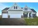 Attractive home with a three-car garage, stone accents, and a welcoming entrance at Lot 51 Watercourse Way # Arcadia, Belmont, NC 28012