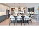 A kitchen featuring an island with seating, modern appliances, and stylish pendant lighting above the island at Lot 51 Watercourse Way # Covington, Belmont, NC 28012