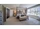 Bright bedroom featuring a four poster bed, plush carpet, and a relaxing atmosphere at Lot 51 Watercourse Way # Covington, Belmont, NC 28012