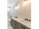 Bathroom featuring double sinks with quartz countertops and modern vanity at 149 Pinewood St, Troutman, NC 28166