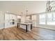 Modern kitchen with stainless steel appliances, island, and ample cabinet space at 149 Pinewood St, Troutman, NC 28166