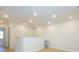Bright and open loft area with hardwood floors and a view to the hallway at 157 Halite Ln, Waxhaw, NC 28173