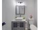 Modern bathroom with gray vanity and white sink at 2335 Emanuel Church Rd, Rockwell, NC 28138