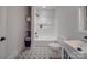 Clean bathroom with bathtub and patterned floor at 2335 Emanuel Church Rd, Rockwell, NC 28138