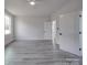 Spacious bedroom with ceiling fan and large window at 2335 Emanuel Church Rd, Rockwell, NC 28138