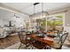 Open concept dining area with views into the living room at 4080 Point Clear Dr, Tega Cay, SC 29708