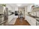 Modern kitchen with stainless steel appliances and white cabinets at 4080 Point Clear Dr, Tega Cay, SC 29708