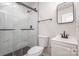 Clean bathroom, featuring a walk-in shower and white vanity at 429 Dare Dr, Charlotte, NC 28206