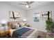 Inviting bedroom with modern decor and wooden furniture, featuring ample natural light at 429 Dare Dr, Charlotte, NC 28206