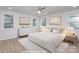 Serene bedroom with a neutral color scheme, featuring ample natural light and stylish decor at 429 Dare Dr, Charlotte, NC 28206
