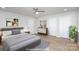 Comfortable bedroom showcasing modern decor, wood-look floors, and plenty of natural light at 429 Dare Dr, Charlotte, NC 28206