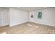 Bright and airy living room with hardwood floors and recessed lighting at 429 Dare Dr, Charlotte, NC 28206