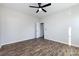 Spacious bedroom with wood-look floors and ceiling fan at 805 Cedar St, Salisbury, NC 28144