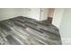 Bedroom featuring wood flooring and large closet doors at 104 Salem Springs Ln, Statesville, NC 28625
